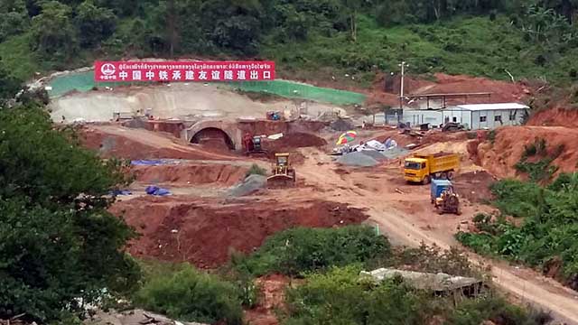 A construction crew builds a tunnel for the Lao-Chinese high-speed railway in northern Laos' Luang Namtha province, July 12, 2017. 
